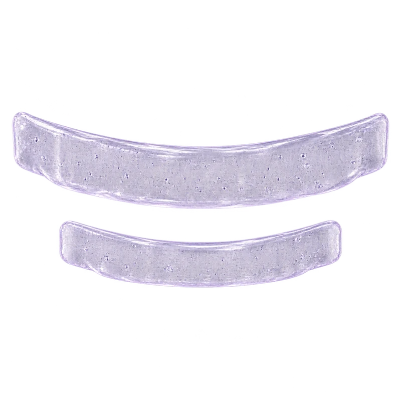 Two transparent whitening strips placed over upper and lower teeth